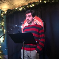 Emre Tetik reads at Line Break #25 - click to view - mousewheel to zoom